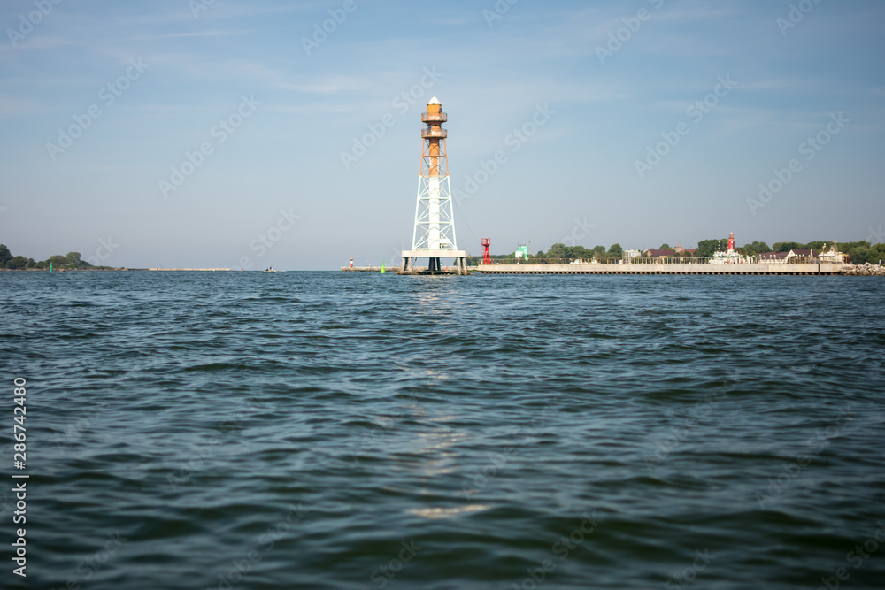 .lighthouse in the middle of the bay