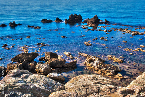 Blue sea with rocks
