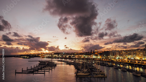 View of harbor at Ponta Delgada, Azores, Sao Miguel Island at sunset. Ocrober 10, 2018. Azores, Portugal. photo
