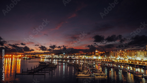 Night view of harbor at Ponta Delgada  Azores at Sao Miguel Island at epic sunset. Ocrober 10  2018. Azores  Portugal.