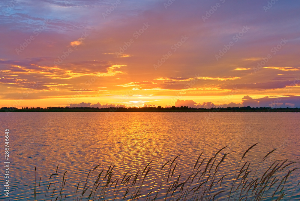 Summer sunset on Sorozhye Lake. Kostroma region, Russia.