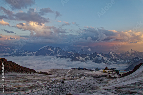 Sunset on Mount Elbrus in summer while climbing.