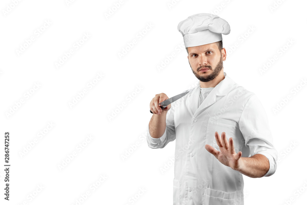 A man with a beard, a cook in a hat and a knife in his hand Isolated on a white background. Cooking, recipes, cuisine. A man with a beard, a cook in a hat and a knife in his hand Isolated on a white background. Cooking, recipes, cuisine.