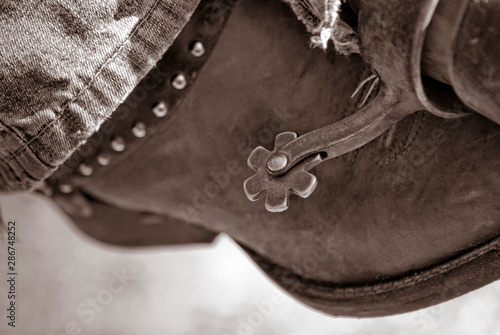 old cowboy boot and spur