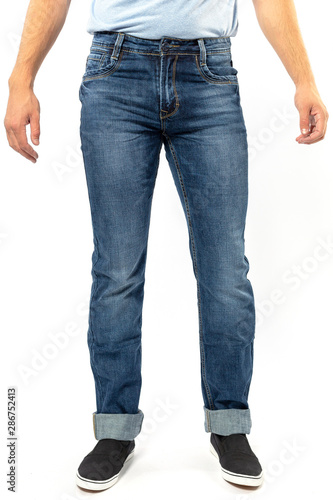 man in jeans, denim pants closeup on white background, blue jeans