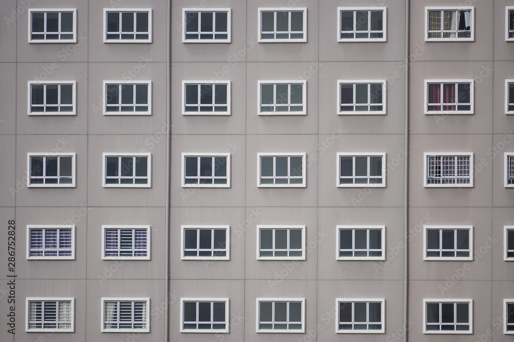 Windows in a row on facade of apartment building
