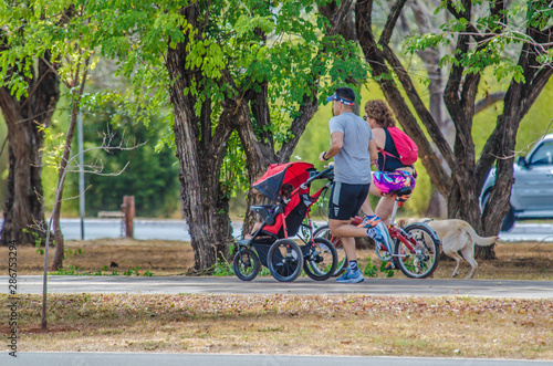 A beautiful view of people walking with Bike in Brasilia park, Brazil