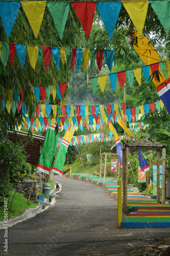 Road to Success. Colorful multicolored triangular flags  hang on a rope.