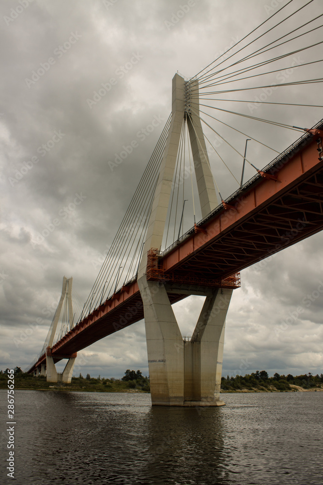 Cable-stayed bridge in Murom Russia across the Oka river on a summer cloudy day Cable-stayed bridge in Murom Russia across the Oka river on a summer cloudy day