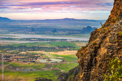 Amazing view from Mt. Zwegabin onto Buddhist Kyauk Kalap Pagoda photo