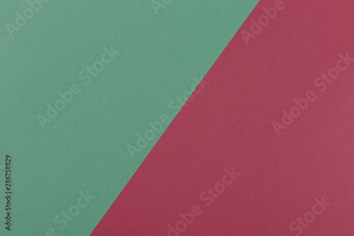 Paper green, burgundy empty background, geometrically located. Color blank for presentations, copy space.
