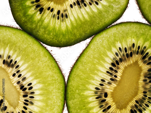 Kiwi slices fruit isolated on white background