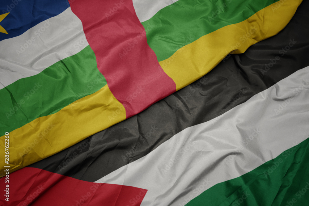 Obraz premium waving colorful flag of palestine and national flag of central african republic.
