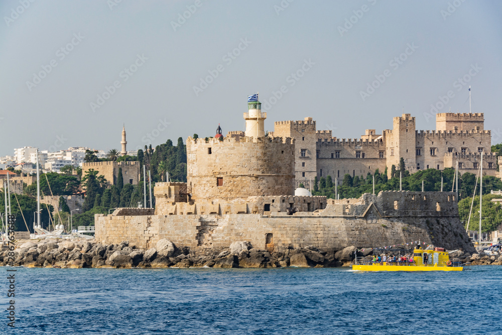 Views of the island of Rhodes while walking on a ship on the Aegean Sea.