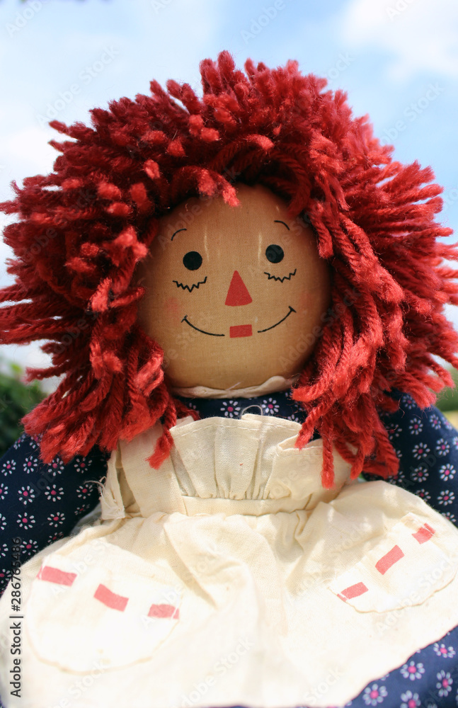 raggedy Anne doll sitting outside Old Time Rag Doll Ghost mystic