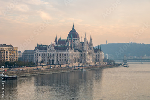 Aerial view of Budapest parliament and the Danube river at sunset, Hungary. © k_samurkas