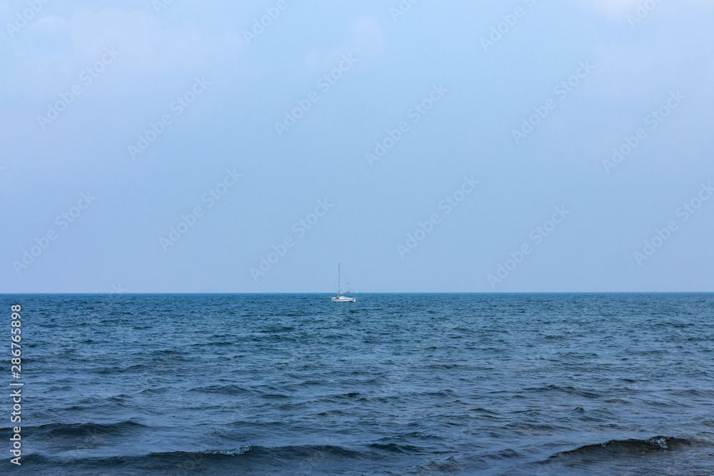 Fototapeta premium sailboat anchored in the sea
