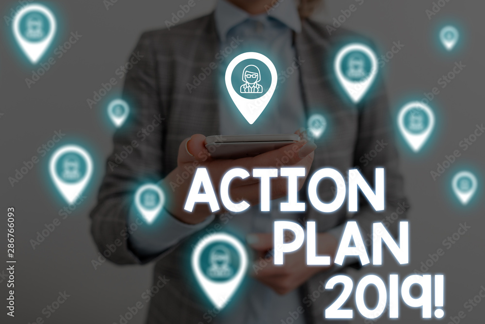 Handwriting text writing Action Plan 2019. Conceptual photo proposed strategy or course of actions for current year Woman wear formal work suit presenting presentation using smart device Handwriting text writing Action Plan 2019. Conceptual photo proposed strategy or course of actions for current year Woman wear formal work suit presenting presentation using smart device
