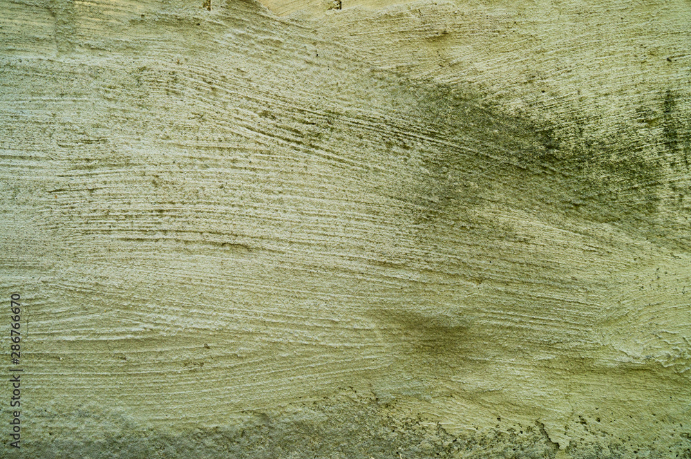 Obraz premium Destroyed plaster. Bonded plaster. Old plaster and putty. The ruined building. Devastation. Stagnation.