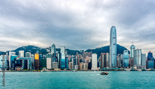 Stormy clouds over Hong Kong bay  city scyline