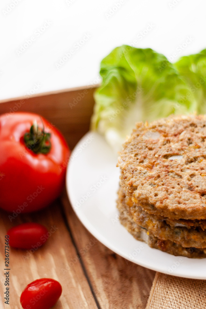 quinoa vegetable burger with tomato quinoa vegetable burger with tomato