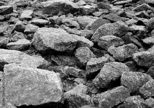 Photos Granite stones background.
