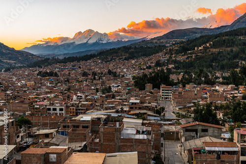 Overlooking the city of Huaraz with Huascaran mountain in the background in Peru.    © Bryan