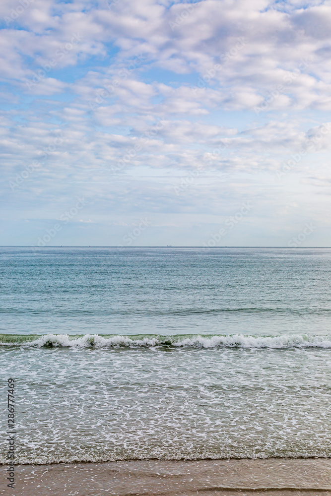 Fototapeta premium Looking out over the sea on the island of Jersey, on a summers day
