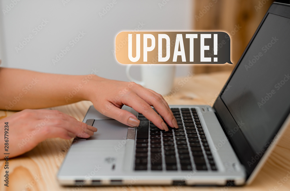 Word writing text UPDATE. Business photo showcasing make something more modern or up to date like software program woman laptop computer smartphone mug office supplies technological devices Word writing text UPDATE. Business photo showcasing make something more modern or up to date like software program woman laptop computer smartphone mug office supplies technological devices