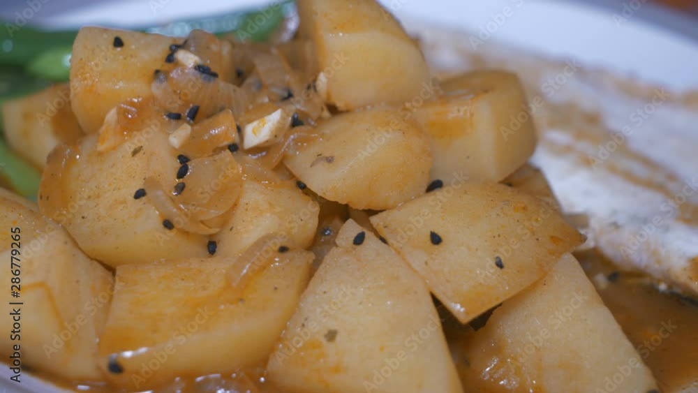 Potato with black seeds, trimmed beans and basa fillet. Potato with black seeds, trimmed beans and basa fillet.