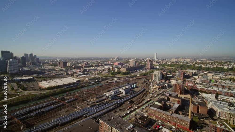 Jersey City New Jersey Aerial v4 Panning cityscape of Jersey City with Hoboken Transit Terminal - October 2017 Jersey City New Jersey Aerial v4 Panning cityscape of Jersey City with Hoboken Transit Terminal - October 2017