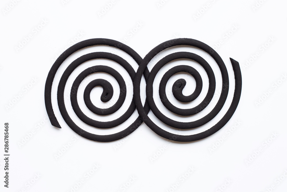 Black spiral Mosquito Repellent coils on white Black spiral Mosquito Repellent coils on white
