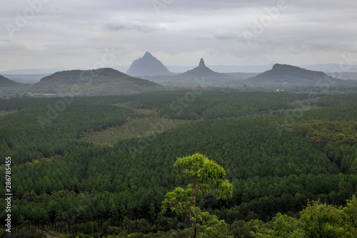 Glass house mountains from wild horse lookout Sunshine Coast Queensland Australia on overcast cloudy day