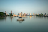 Manhattan Yacht club wit jersey city on background at sunrise with long exposure