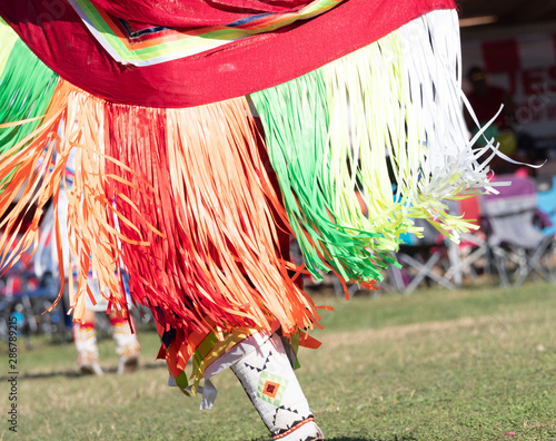 Close Up of a Ribbon Fringed Shawl Worn by Pow Wow Dancer photo