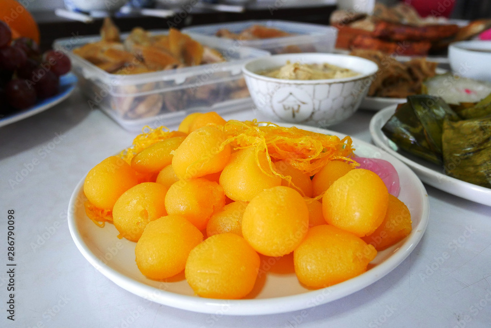 Thong Yod or Candy Golden Ball cooked with egg in syrup is sweet Thai dessert. Thong Yod or Candy Golden Ball cooked with egg in syrup is sweet Thai dessert.