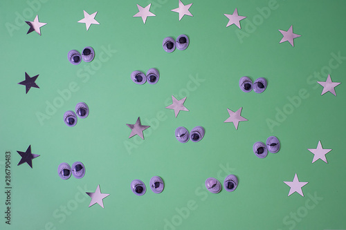 Wallpaper Mural Decorative eyes on a green background. Halloween concept Trick or treat. Creative concept for halloween. Flat lay, top view, copy space Torontodigital.ca