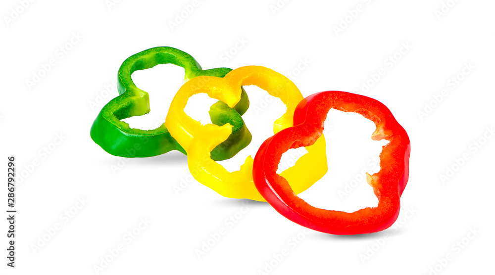 Fototapeta premium sliced red yellow green bell pepper on white background