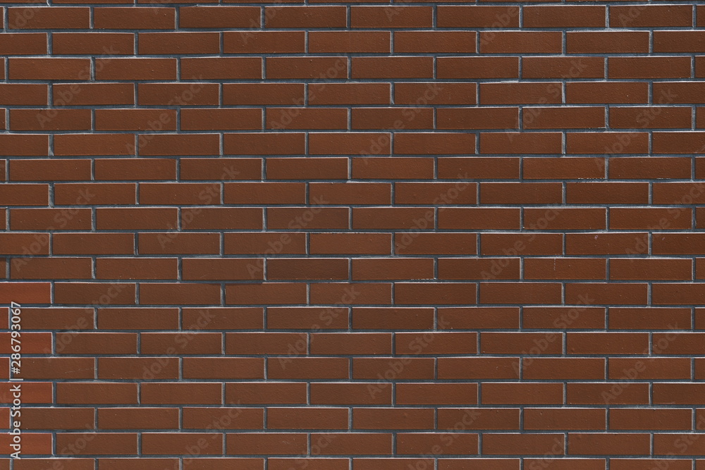 Obraz premium 茶色のタイル壁