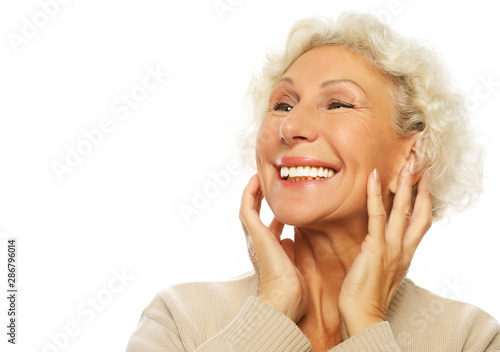 lifestyle, emotion and people concept: Grey haired old nice beautiful laughing woman.