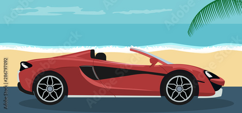 Background of a red luxury convertible modern car on the beach in summer © Ipajoel