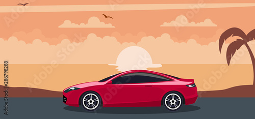 Red modern car background on a sunset at the beach © Ipajoel