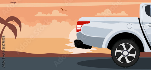Pickup truck background on a sunset at the beach