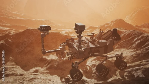 Curiosity Mars Rover exploring the surface of red planet. Elements of this image furnished by NASA. photo