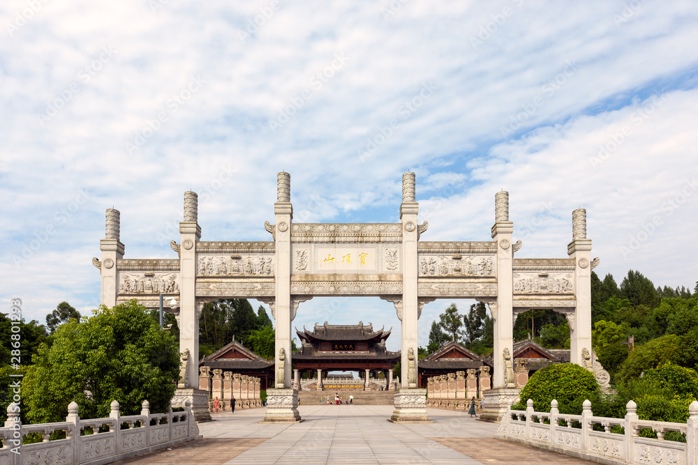 Main entrance to Dazu Rock Carvings at Mount Baoding or Baodingshan in Dazu District, Chongqing, China. UNESCO World Heritage. Main entrance to Dazu Rock Carvings at Mount Baoding or Baodingshan in Dazu District, Chongqing, China. UNESCO World Heritage.