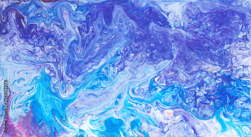 Colorful violet and blue wavy texture. Abstract acrylic painting. Fluid art.