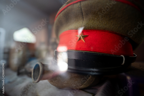 Foto Old Military Cap With Red Star Symbol, The scene war cap in World War 2