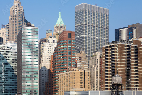Photography Manhattan cityscape with a water tower in foreground, New York City, USA