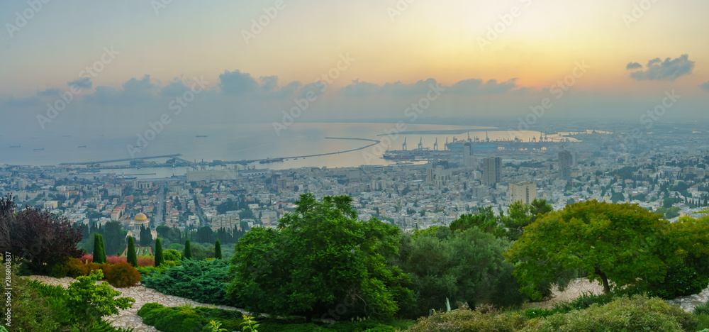 Sunrise panorama of downtown Haifa, the port, and the bay