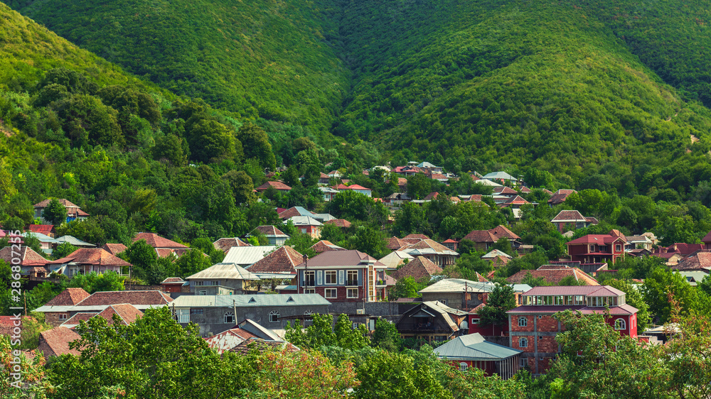 Panoramic view of Sheki city, located on the green slope of the mountain